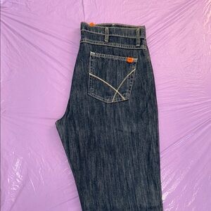 WRANGLER 20X FR Blue Denim Jeans with Orange Label.